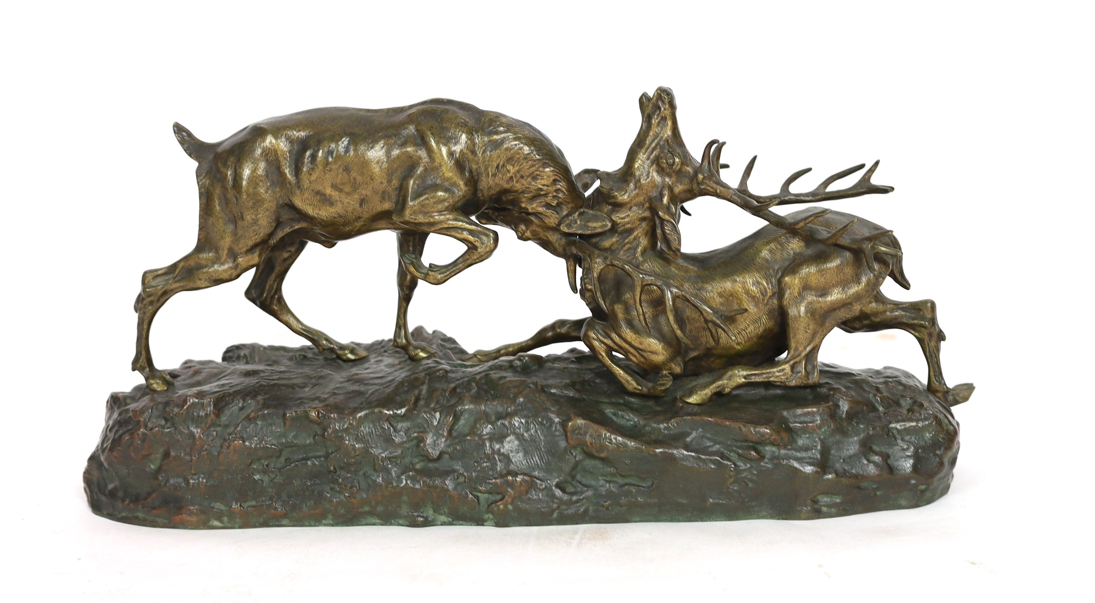 Thomas-Francois Cartier (1879-1943). A bronzed group of rutting stags, width 69cm, height 31cm